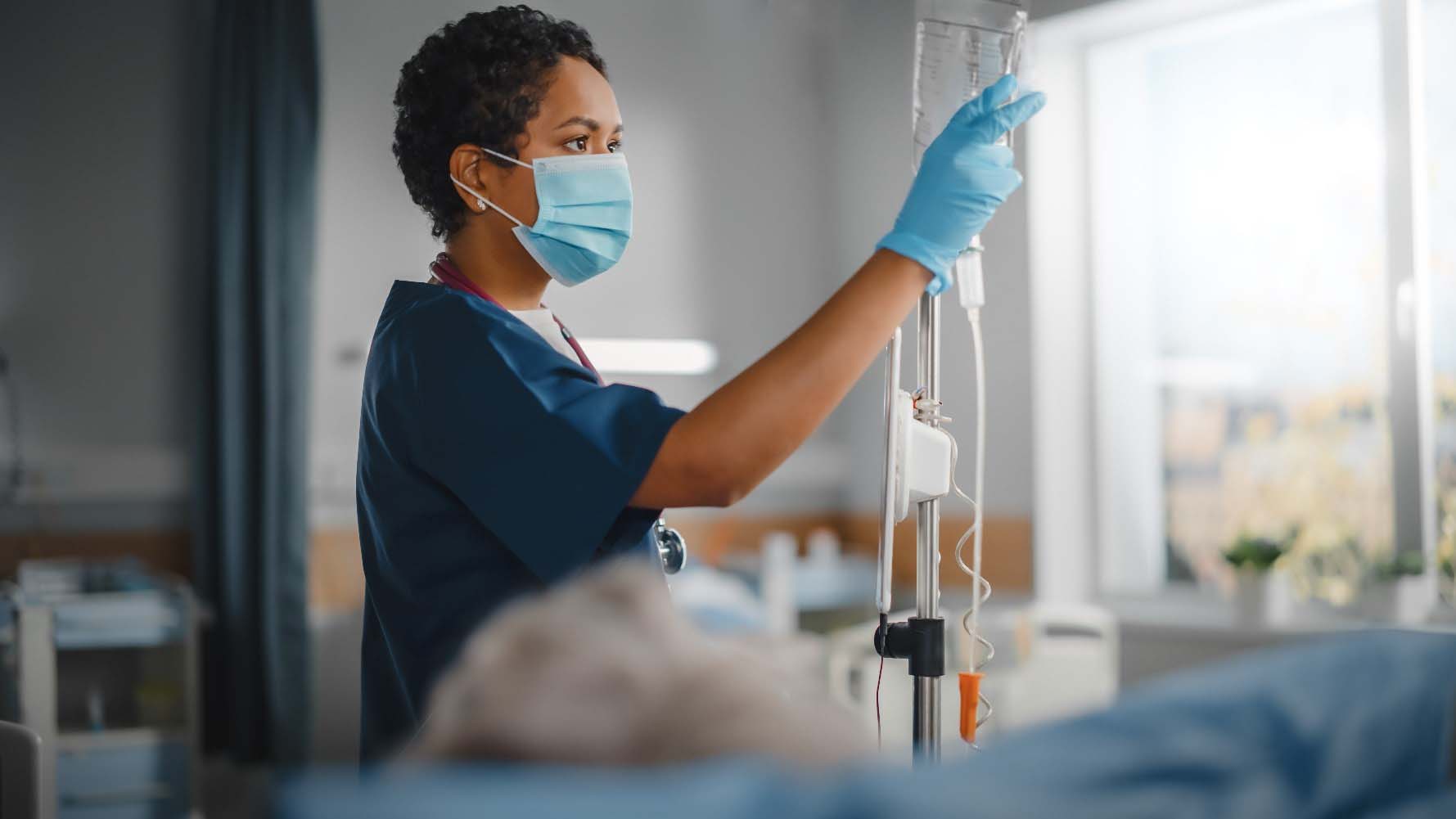 Nurse check an intravenous bag