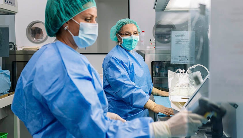 Two pharmaceutical women work in a laboratory